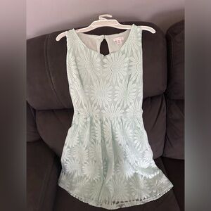 Teen dress size small, will also fit a young girl size 14/16